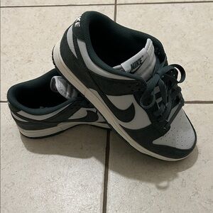 Nike Dunk Low in Dark Green and White with Black Swoosh